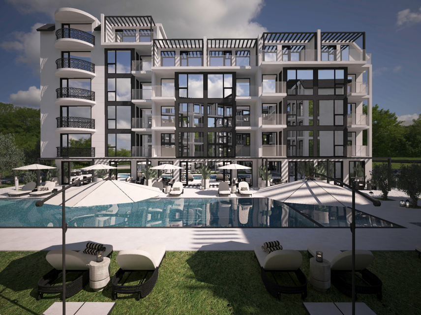 the j'adore blanc relaxing area with the swimming pool 4